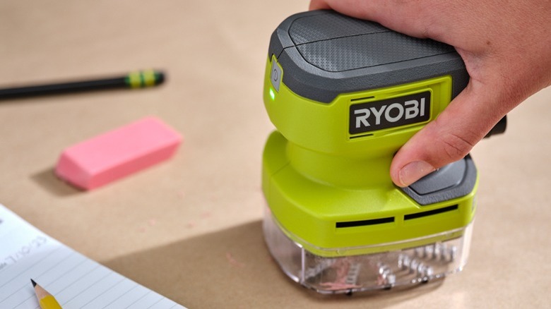 Vacuuming desk with the USB Lithium Desktop Vacuum Kit