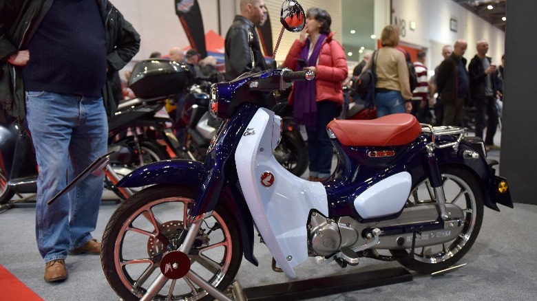 a white Honda Super Cub C125