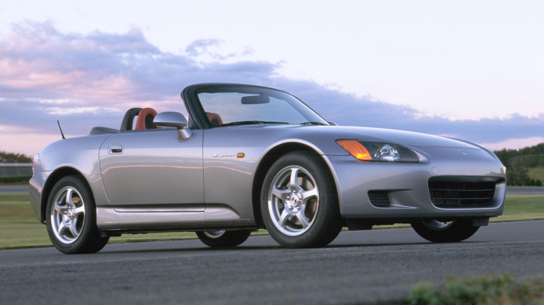 Silver Honda S2000 during the day front 3/4 view