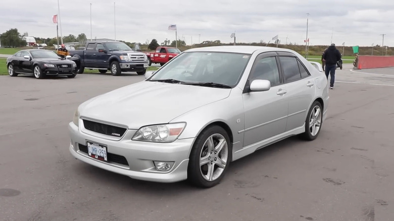 Silver Toyota Altezza on a parking lot front 3/4 view