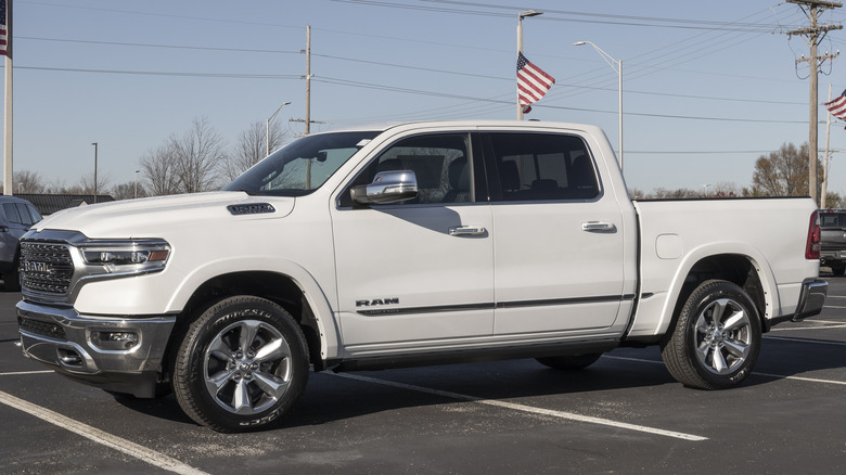 A white Dodge Ram HEMI in a parking lot