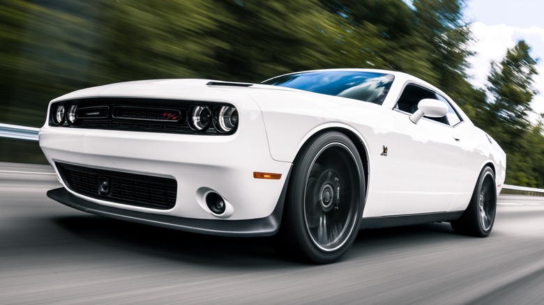 White Dodge Charger R/T on a highway