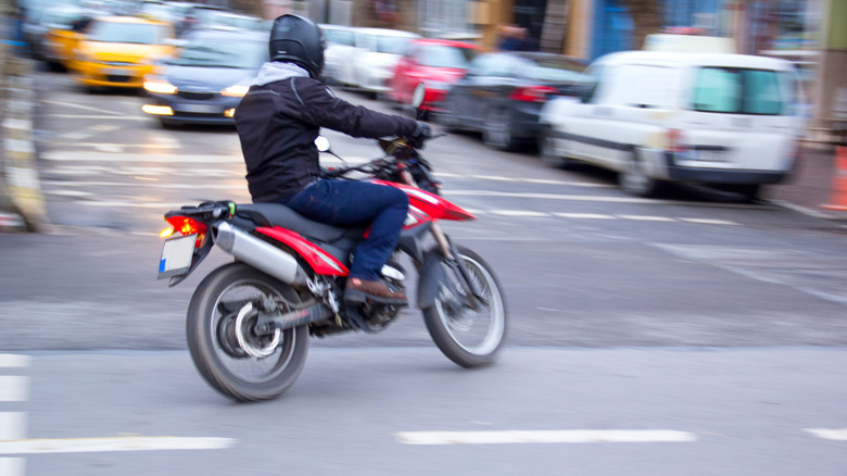 turning on a motorcycle