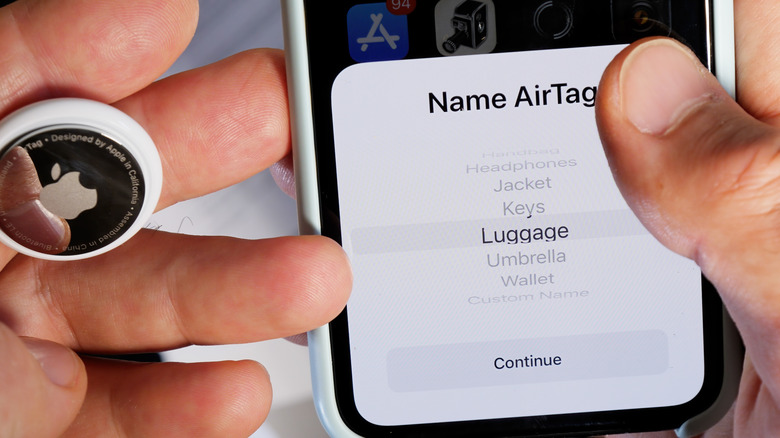 person setting up airtag