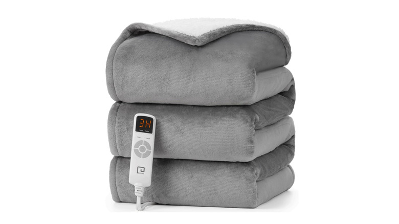 Folded heated blanket with controller