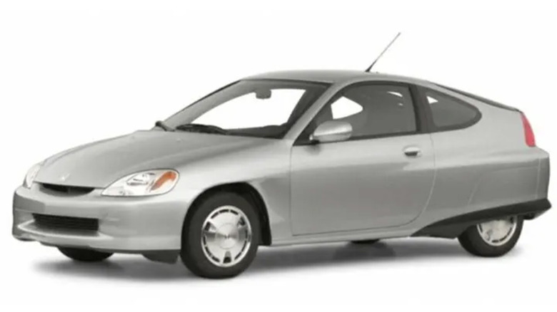 gray 2000 Honda Insight on a white background