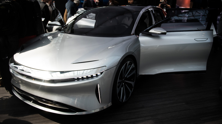 gray Lucid Air on a showroom floor