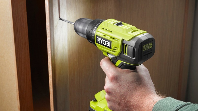 ONE+ 18V Cordless 1/2 in. Drill/Driver used on a cupboard door