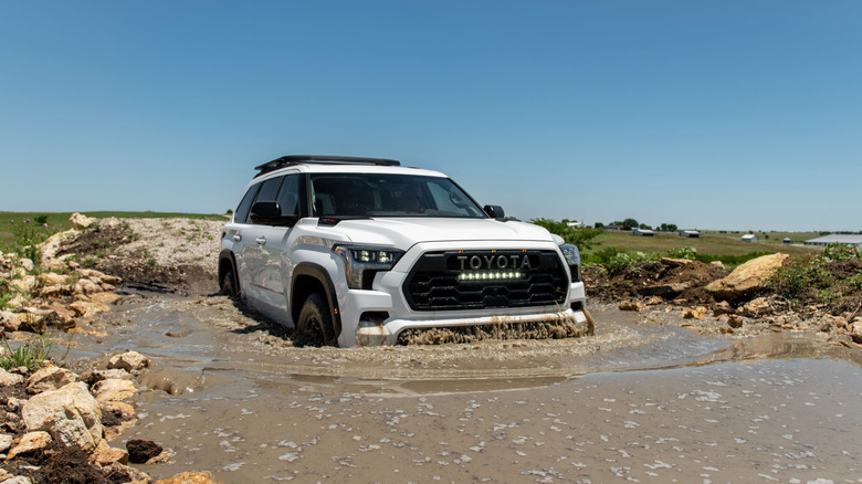 2024 Toyota Sequoia driving through a puddle