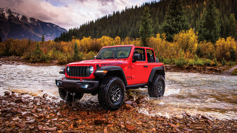 2025 Jeep Wrangler Rubicon convertible two-door crossing a river