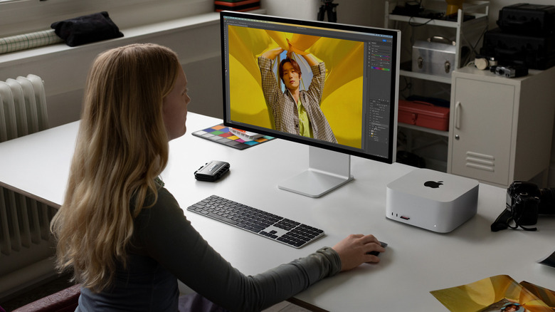 Person working on Apple Mac Studio PC