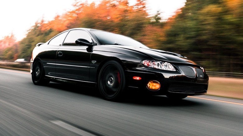 Pontiac GTO driving at speed