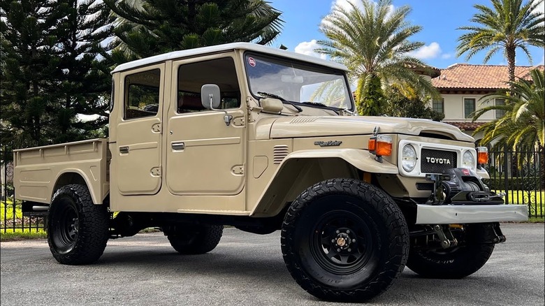 Beige Toyota Land Cruiser FJ45 pickup truck