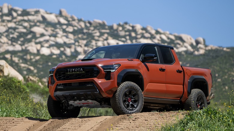 Red 2024 Toyota Tacoma TRD Pro Fourth-Gen off-roading