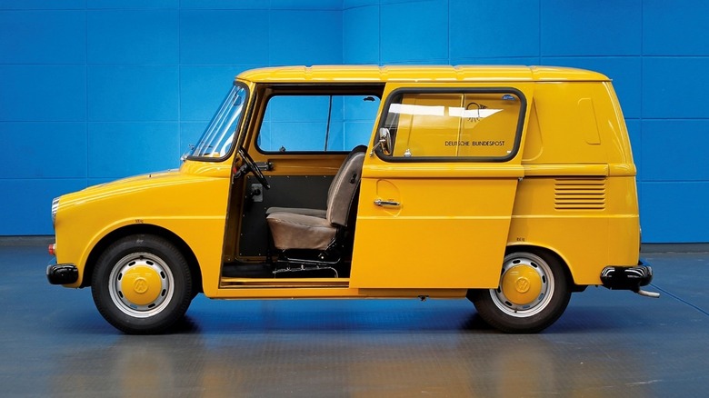 Yellow Volkswagen Fridolin parked with door open