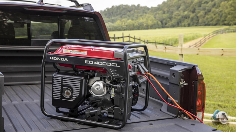 Honda portable generator in a pickup truck bed