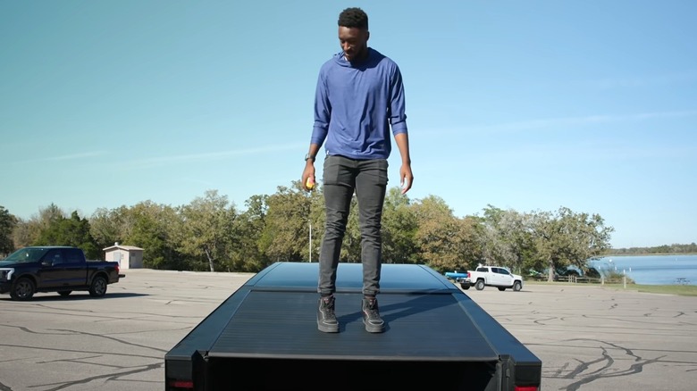 marques brownlee standing on truck