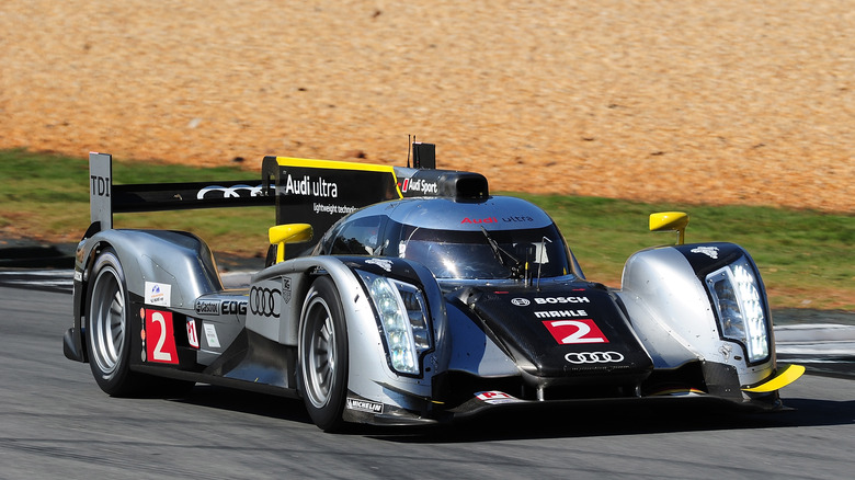 Tom Kristensen of Denmark drives the #2 Audi Sport Team Joest Audi R18 TDI during practice for the American Le Mans Series Petit Le Mans Powered by Mazda at Road Atlanta on September