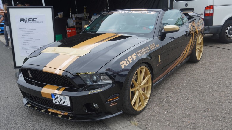 A decked out 2013 Mustang Shelby GT500 at an auto show