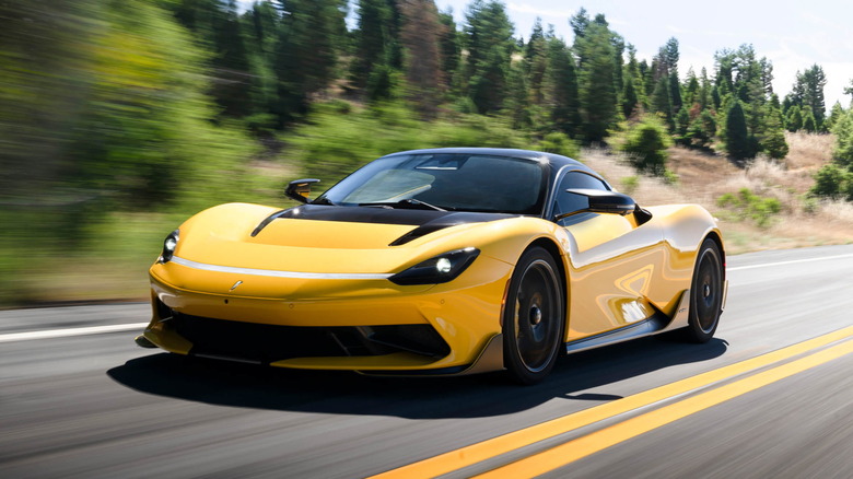 Yellow Pininfarina Battista electric hypercar driving