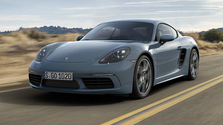 Blue Porsche Cayman on desert road