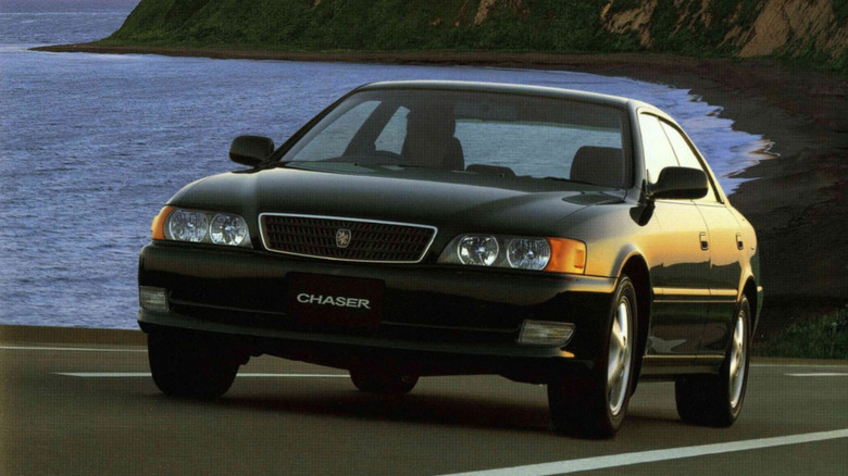 Toyota Chaser Tourer V driving at speed on an open road