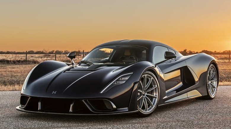 Speed Devil Blue Hennessey Venom F5 parked at sunset