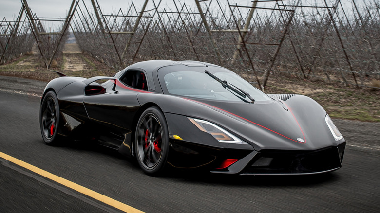 Black SSC Tuatara driving on the road