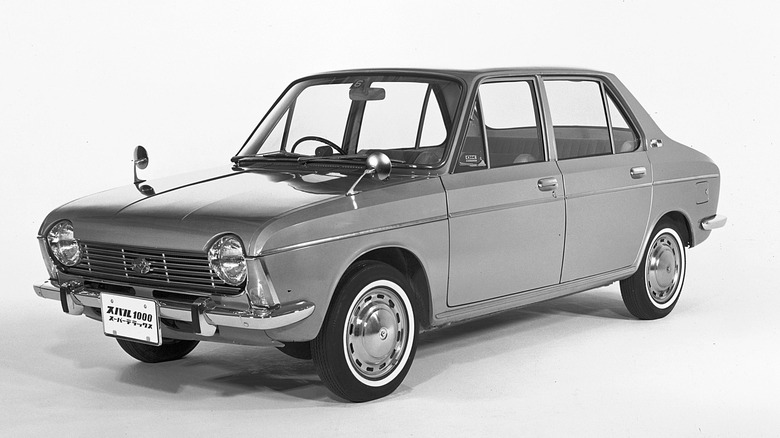 1966 Subaru 1000 sedan front 3/4 view on white background