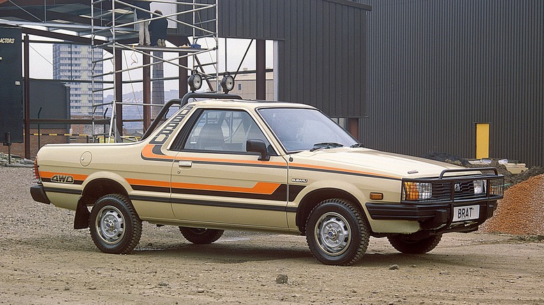 Subaru BRAT pickup parked on a construction site front 3/4 view