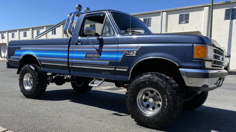 A blue Ford F-250 BigFoot Cruiser for sale