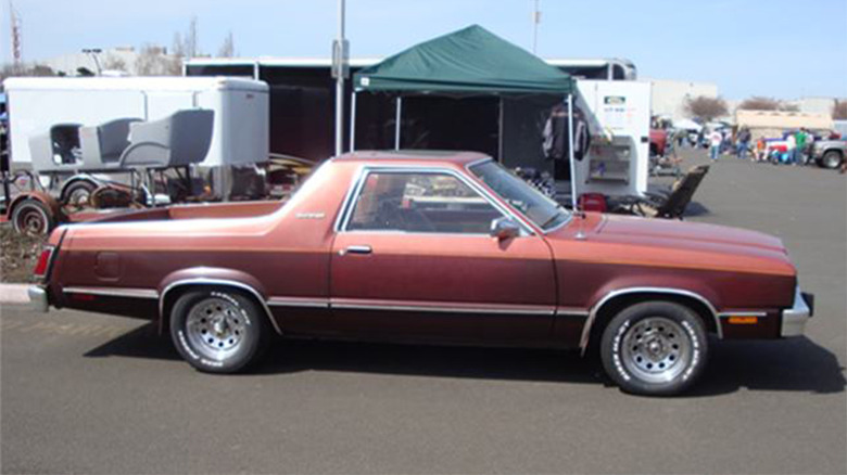 A Ford Durango from the side at a car show