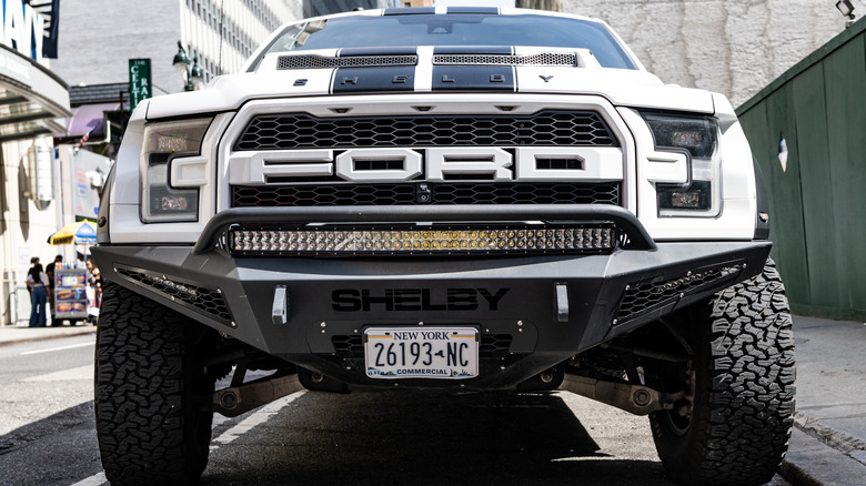 A white Ford F-150 from the front and up close