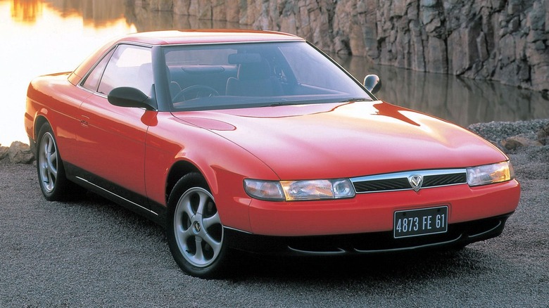 Eunos Cosmo by lake