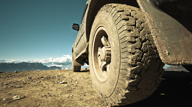 Tire caked in mud