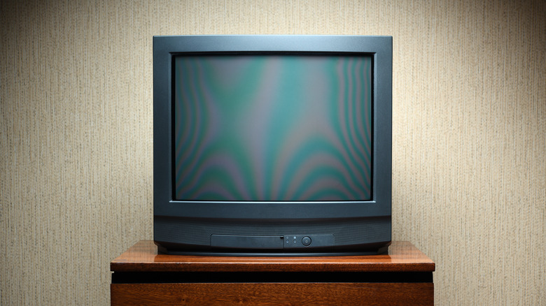 CRT TV on stand