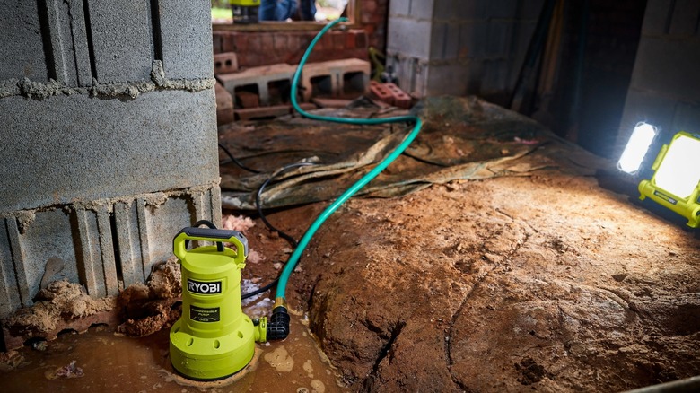 submersible pump clearing a crawl space