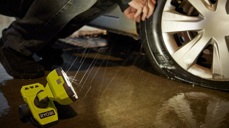 using clamp light to help change tire