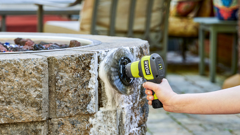 Ryobi handheld power scrubbing tool with accessories