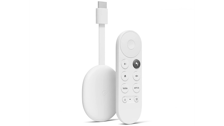 A white Google Chromecast with its remote control