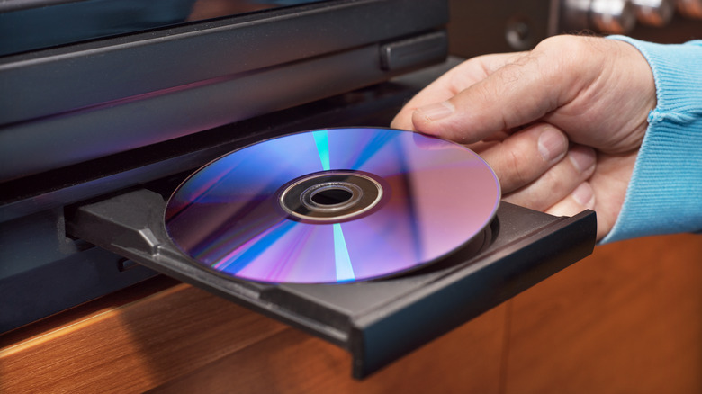 A DVD player being loaded