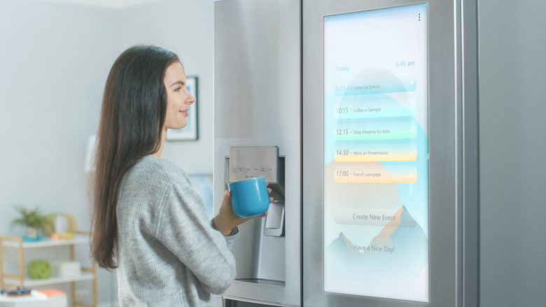 A smart fridge displaying a to do list