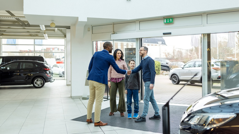 buyers in a car dealership