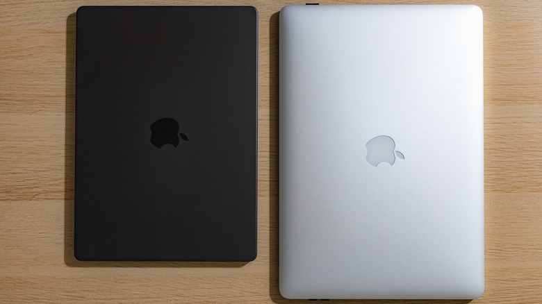 Two MacBooks on table