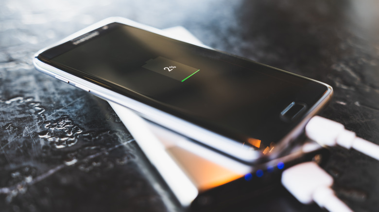 An Android phone charging after its battery has died