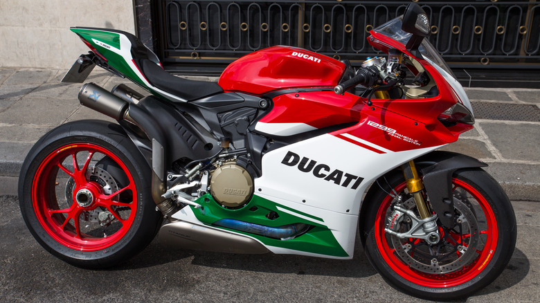 red white and green Ducati 1299 Panigale parked on a street