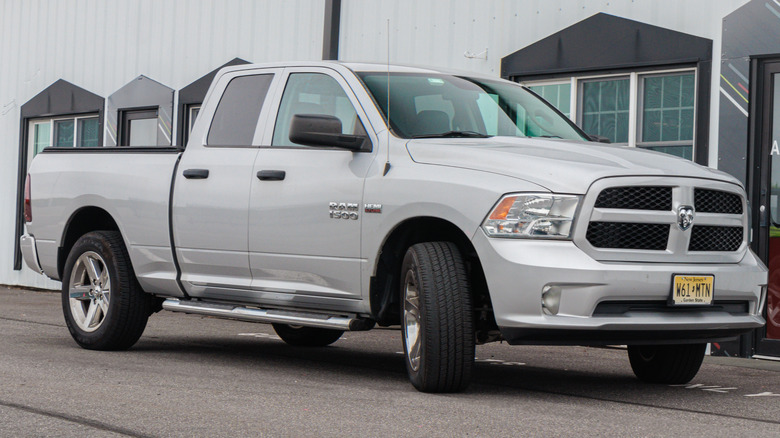 Fourth generation Dodge Ram 1500 parked outside a building