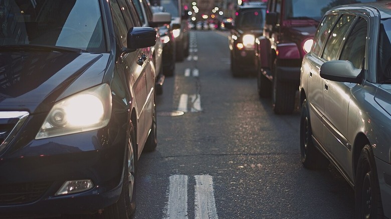 Vehicles with their headlights on