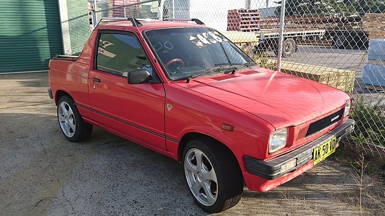 Red suzuki mighty boy car/hybrid pickup