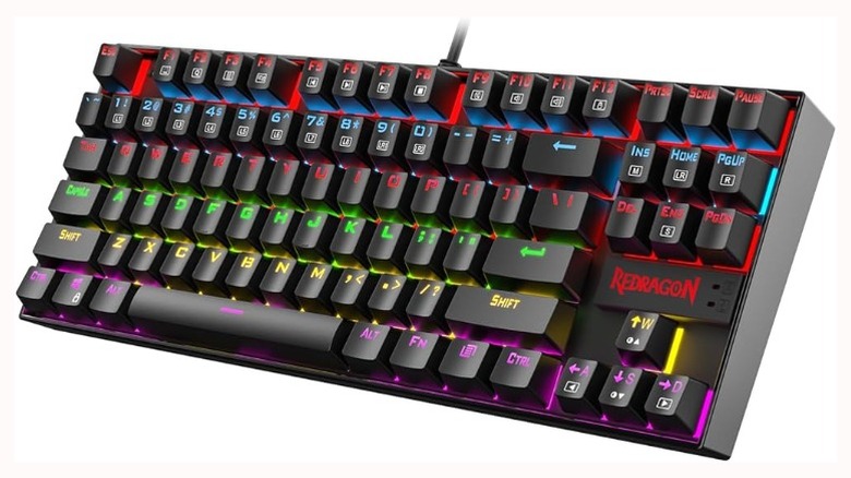 The Redragon K552 Mechanical Gaming Keyboard lit up with different colors.